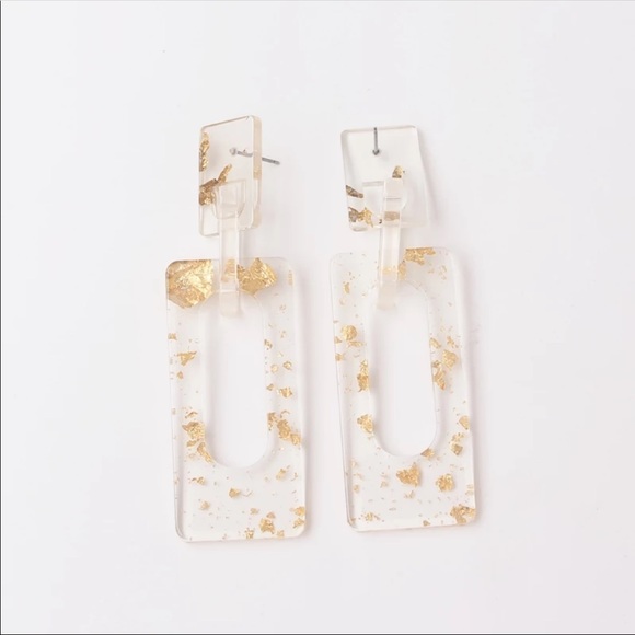 Gold and clear resin sparkle earrings. Rectangle - Picture 2 of 4